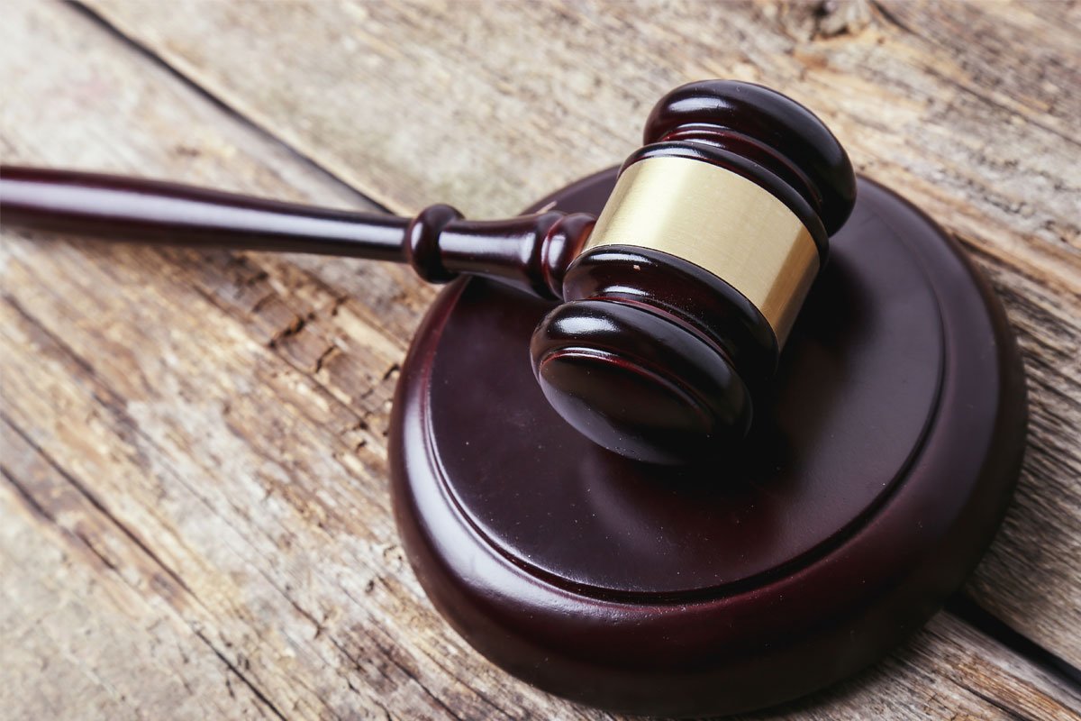 Gavel on a wooden sound block. | Forensic Discovery