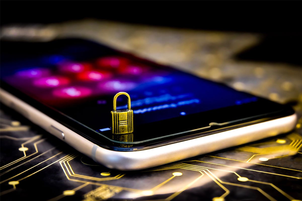 Small gold padlock on a smartphone screen. | Forensic Discovery
