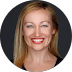 Headshot of a woman with blonde hair and a big smile. | Forensic Discovery